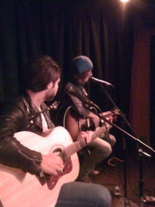 Shane Cooley accompanying Adam Smith on one of his songs last night at Genghis Cohen.