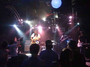 Sharif tearing it up on stage at 12th & Porter.